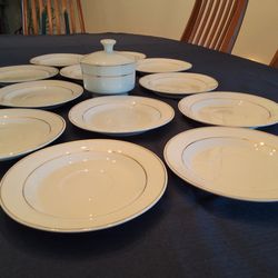 Housewares International 12 Saucers & Lidded Sugar Bowl with Gold Trim.