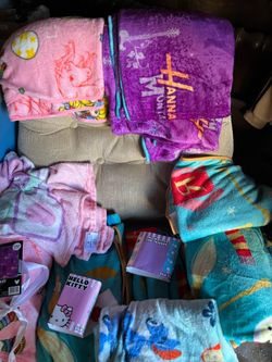 11 Assorted children’s travel blankets