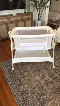 Brand new bedside bassinet never used