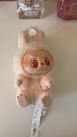 Pink labubu The Monsters Have a Seat