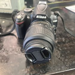 Nikon D3000 Body And Lens