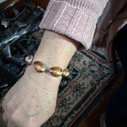 Cowrie shell bracelet.