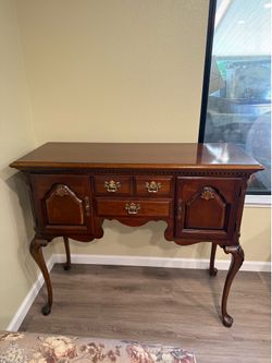 Vintage cherry dinning cabinet.