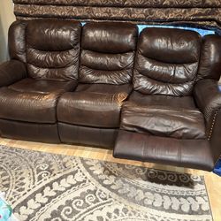 Power reclining sofa and loveseat