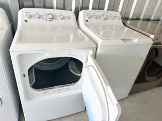 GE Washer and Dryer Set with 30 day warranty delivery available for a fee