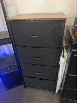 MOVING - 4 drawer dresser with wood top (MSRP $50)