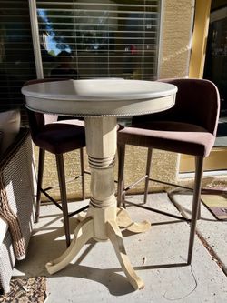 Round Pedestal Table with Two Chairs