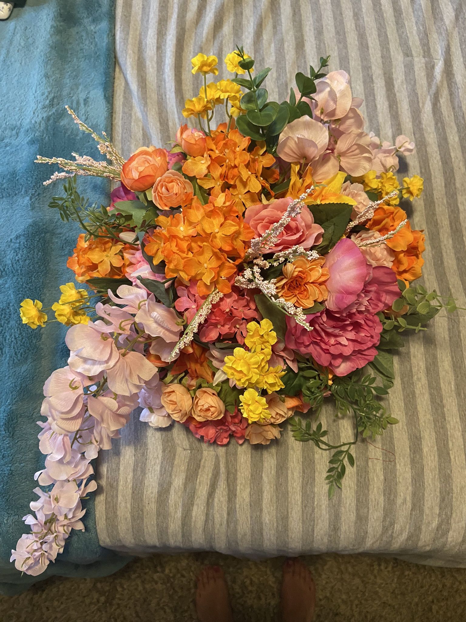 8 orange and pink floral arrangements