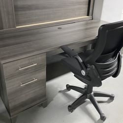 OFFICE DESKS WITH DRAWERS ,GRAY OFFICE CHAIR AND BLACK SPINNING CHAIRS