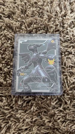 Zekrom Pokémon Card with Pikachu Stamp