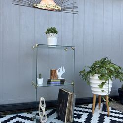 Vintage glass and brass display shelf . 