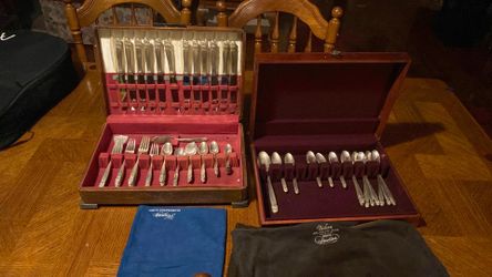 2 wooden chest ,silver plated flatware , cloth