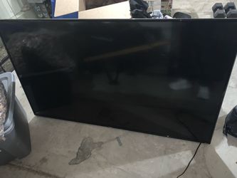 65” smart TV has a stand