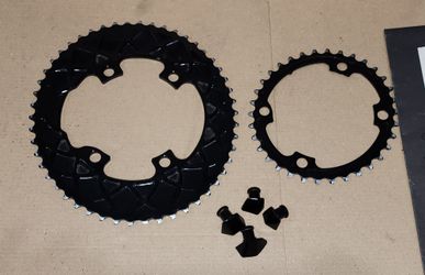 Absolute Black Premium Oval Road Chainrings 50+34 100/4 9100/8000 w/ bolt covers