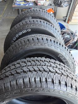 (4) Firestone Transforce AT2 tires (LT285/60 R20) off of a newly purchased 2026 Ram 2500.