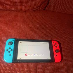 Selling Nintendo switch with joy cons + tablet
