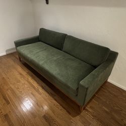 Beautiful Unused Green Sofa With Sold Wood Base
