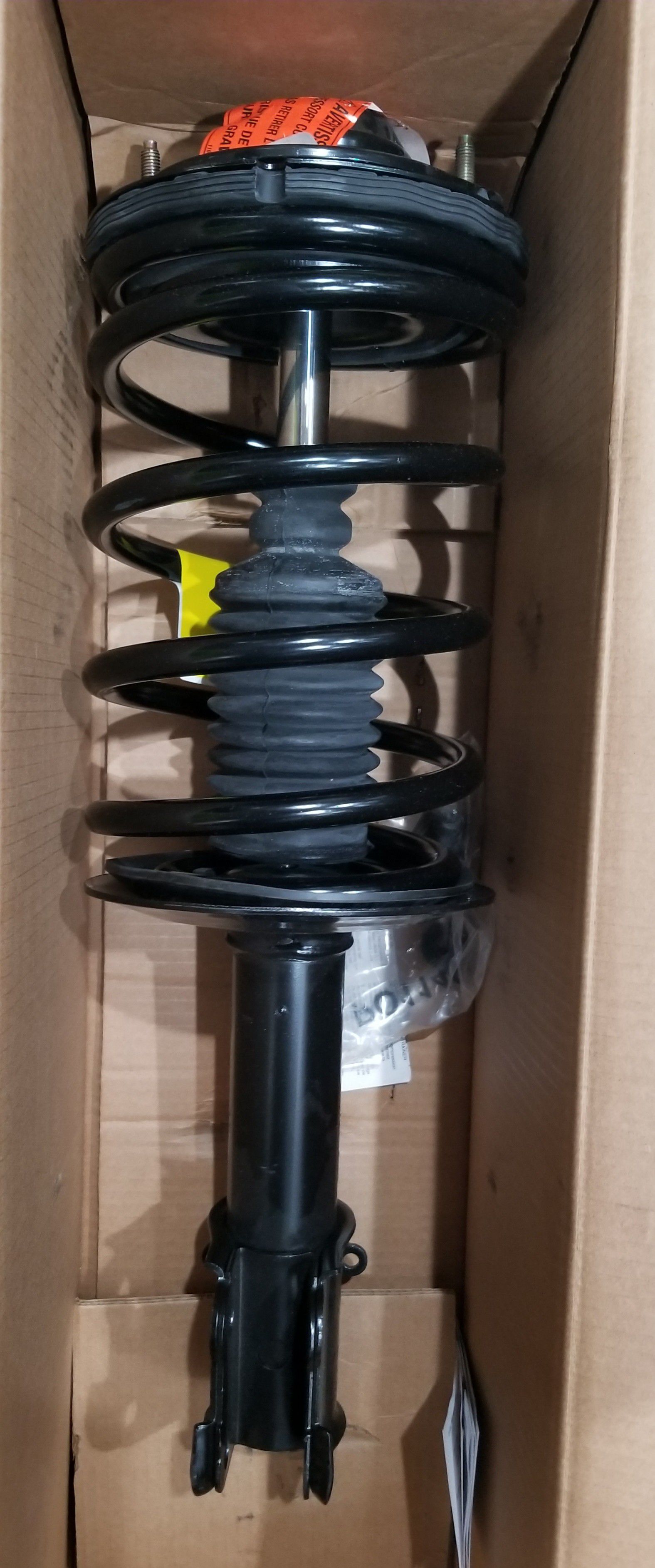 Front shock kit with arm, spring and shock