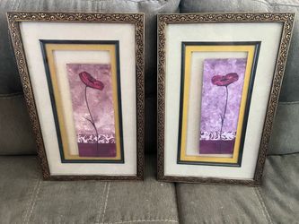 This pair appears to be decorative framed floral art prints featuring single red poppies against a textured purple background with double matting and 