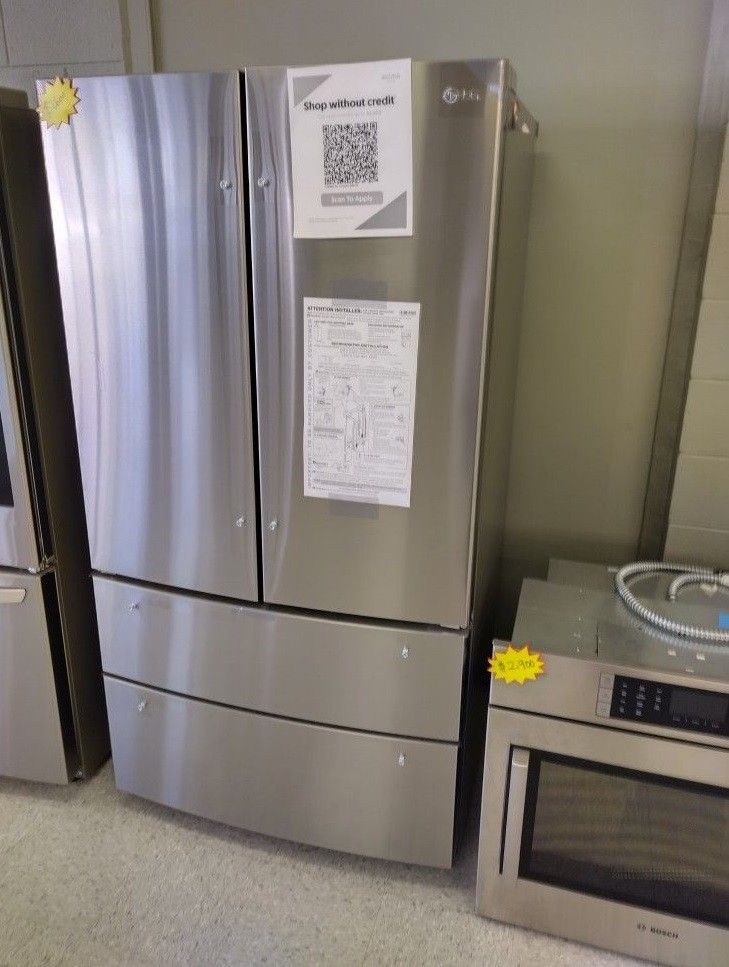 LG STAINLESS STEEL 4 DOOR FRENCH DOOR INTERNAL WATER AND ICE 6N