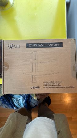 Universal wall mount for DVD/game console, etc