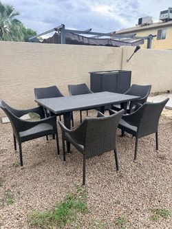 Outdoor table and 6 chairs and a free bar