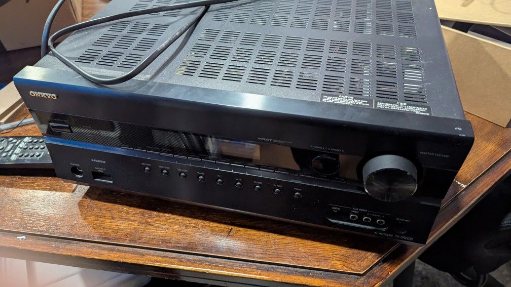 Onkyo Receiver And 7 Onkyo Speakers.