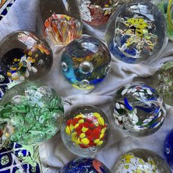 Colorful Paper Weights Variety Of Sizes And Shapes And Colors