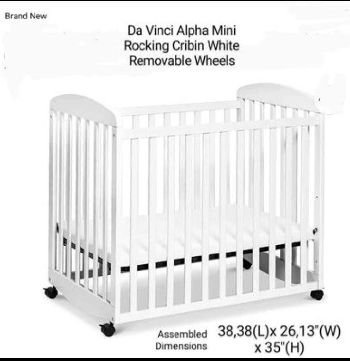 Brand New Da Vinci Alpha Mini Rocking Cribin in White Removable Wheels - Greengard Gold Certified