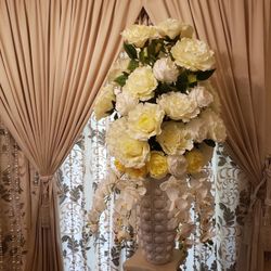 Large Floral Arrangement H48’’X65’’W, Ceramic Vase Height H19’’X27’’W, Fabric And Silk Flowers.