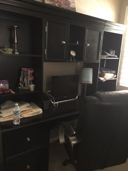 Desk and hutch lots of drawer, and storage.