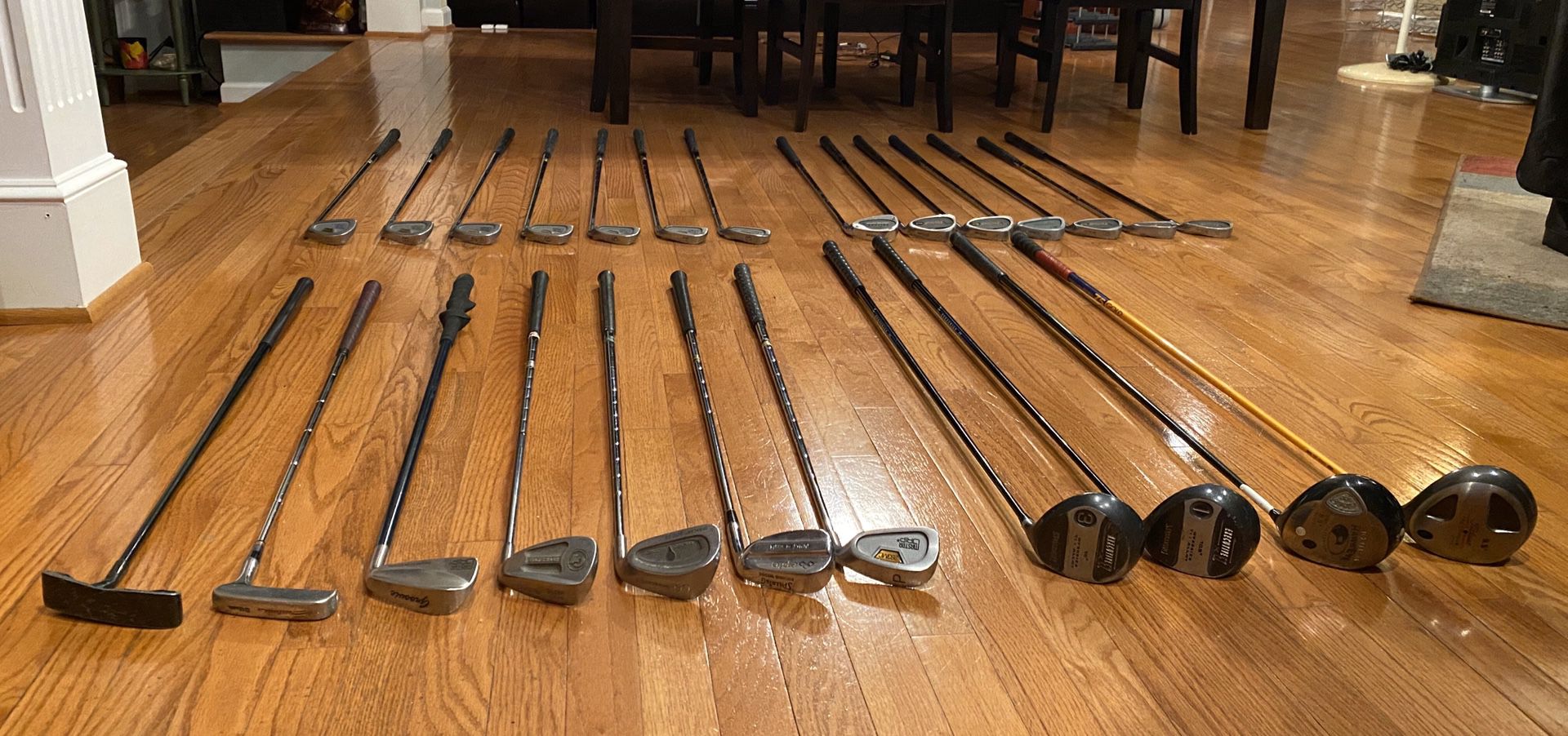 Golf clubs (25), golf bag, new box of titleist golf balls, and golf tees