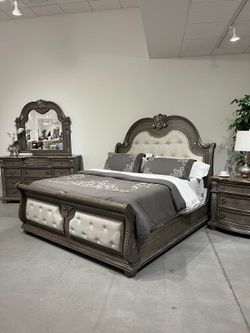 Luxurious Grandeur bedroom set features classic accenting and traditional lines