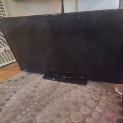 A 50 Inch LG Flat TV. And Wall Mount