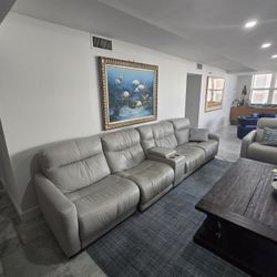Grey Reclining Sofa With All Seats Motorized To Recline