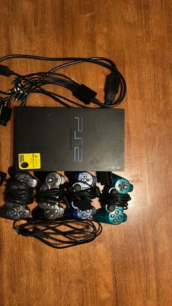 PlayStation two with Av cables and 4 controllers with a 8 mb PlayStation two memory card