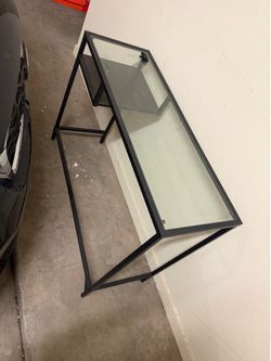 Black metal and glass console table