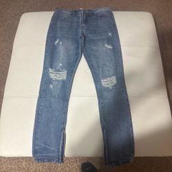 Distressed Skinny Jeans with Ankle Zippers