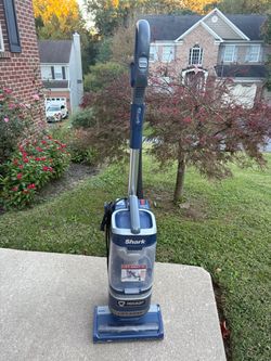 Vacuum cleaner. Great quality and brand, Shark.