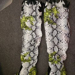 Snakeskin thigh high boots