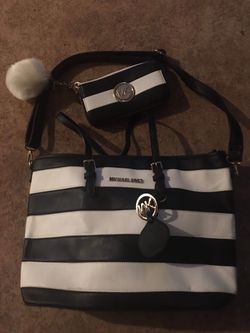 Authentic Micheal Kors handbag and matching wallet set