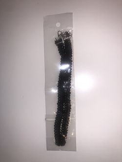 A twisted black choker