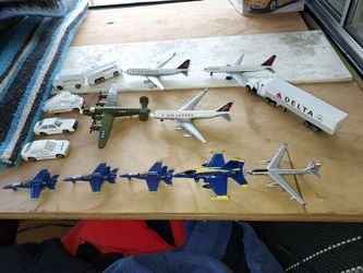 10 Die-cast airplanes and 6 plastic cars