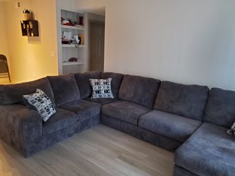 Sectional couch living room... Taken for 1 month...