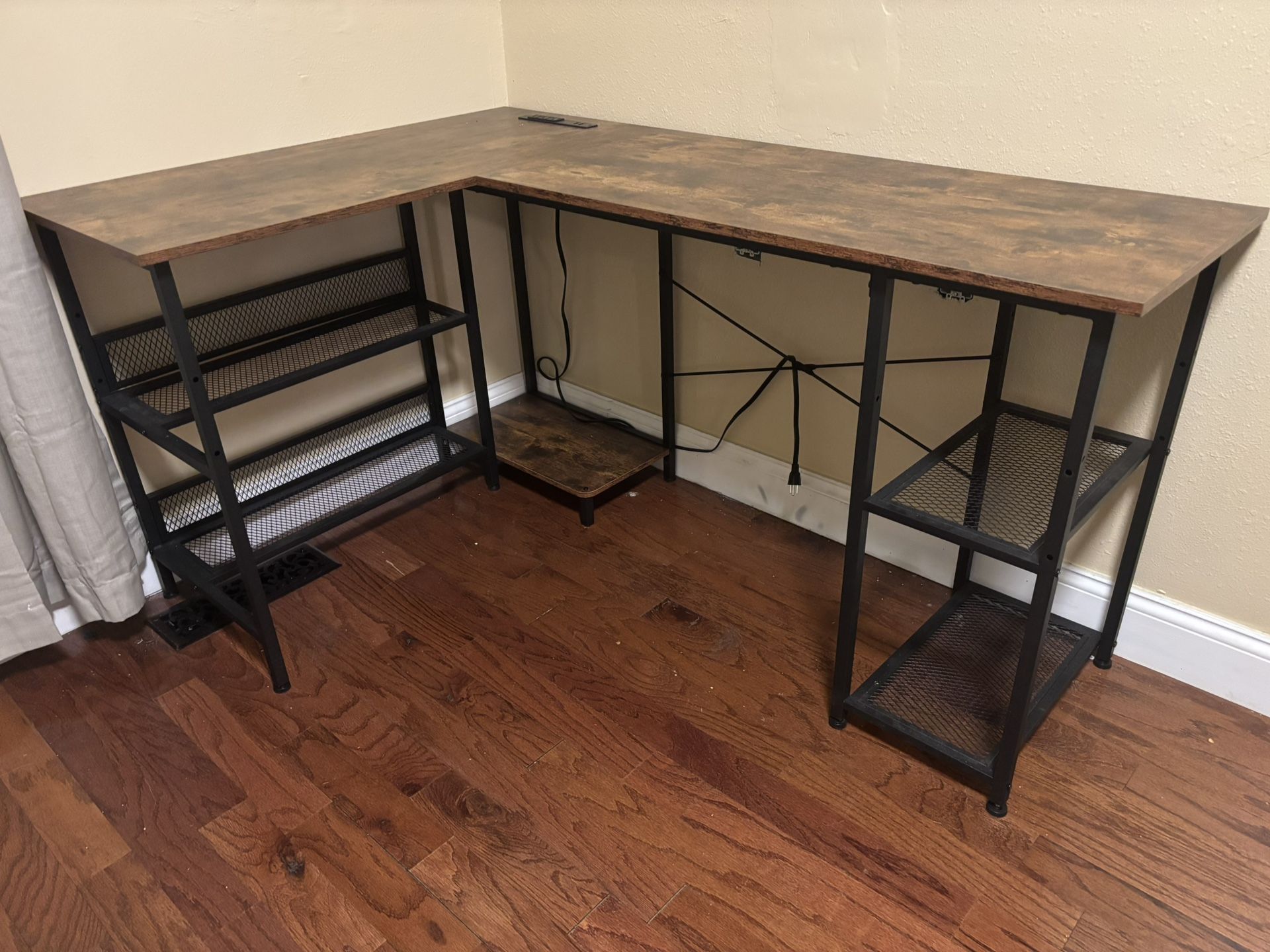 L-Shaped Desk with Shelves and Outlets – $50 (West Seattle)  Sturdy L-shaped desk with wood-style top and metal frame. Includes built-in power strip w