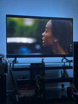 50” LG TV & Stand (w/backlights)