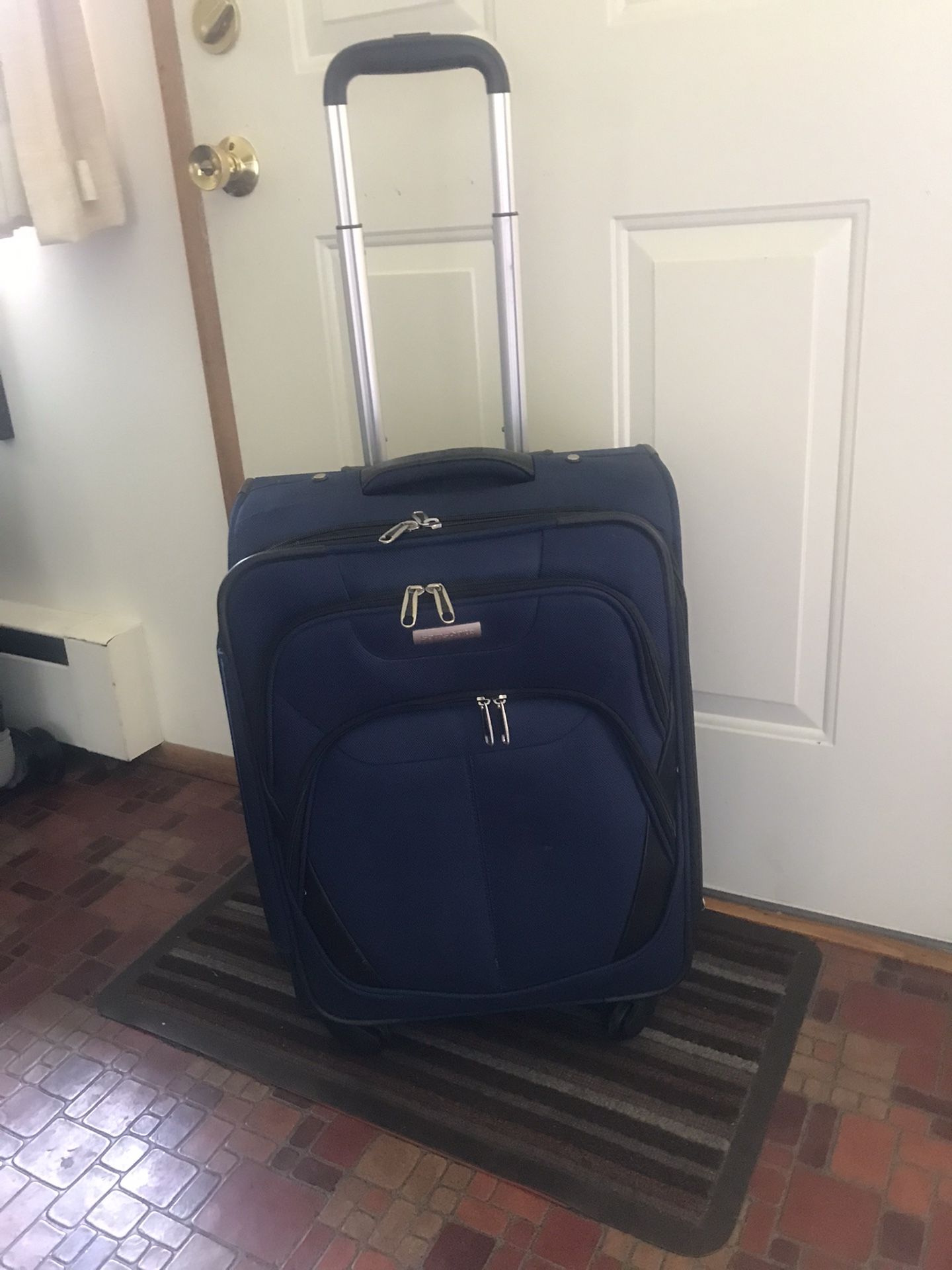 4 Way Rotating Suitcase $30