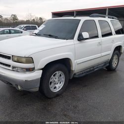 Tahoe suv lather seats  door panels 2003/2004 parts