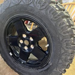 One New  Wheel And Tire