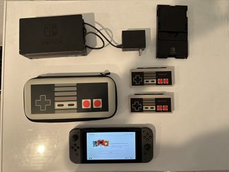 Nintendo Switch w/ extras, NES joy-cons, portable stand & dock